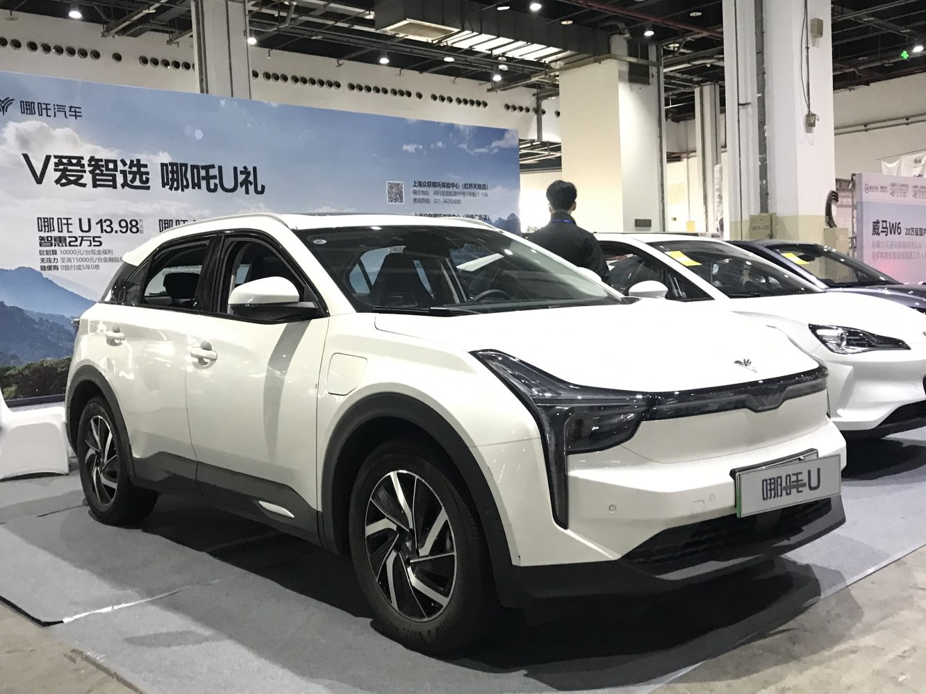 Front three-quarter view of electric SUV with vertical LED headlights