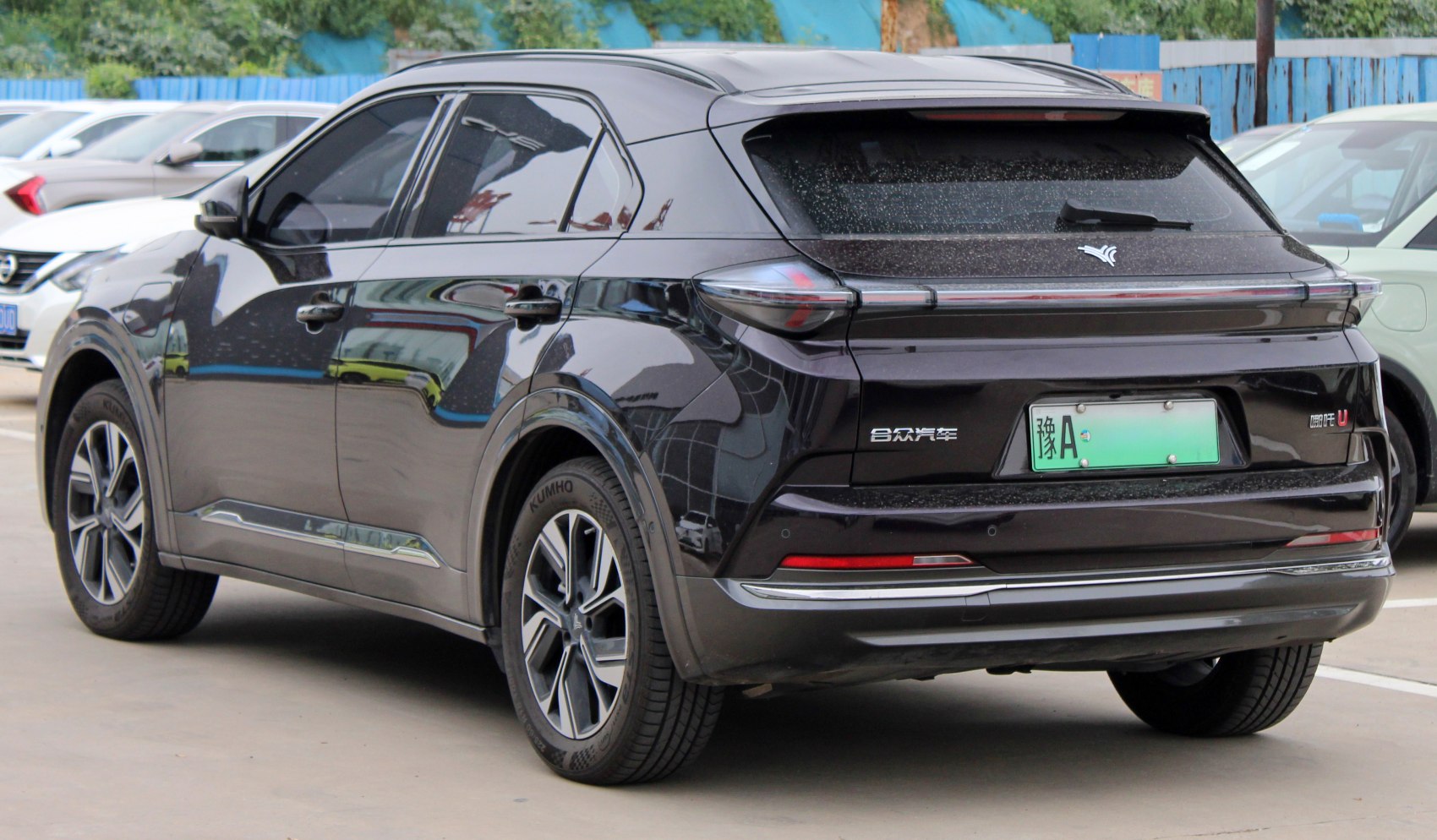 Rear view of electric SUV with sleek taillights and tinted windows