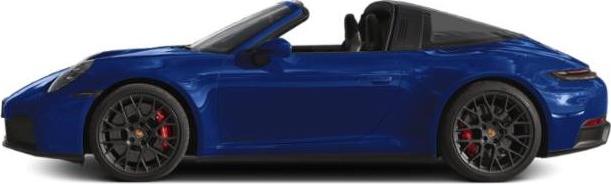 Side profile of open roof sports car with alloy wheels