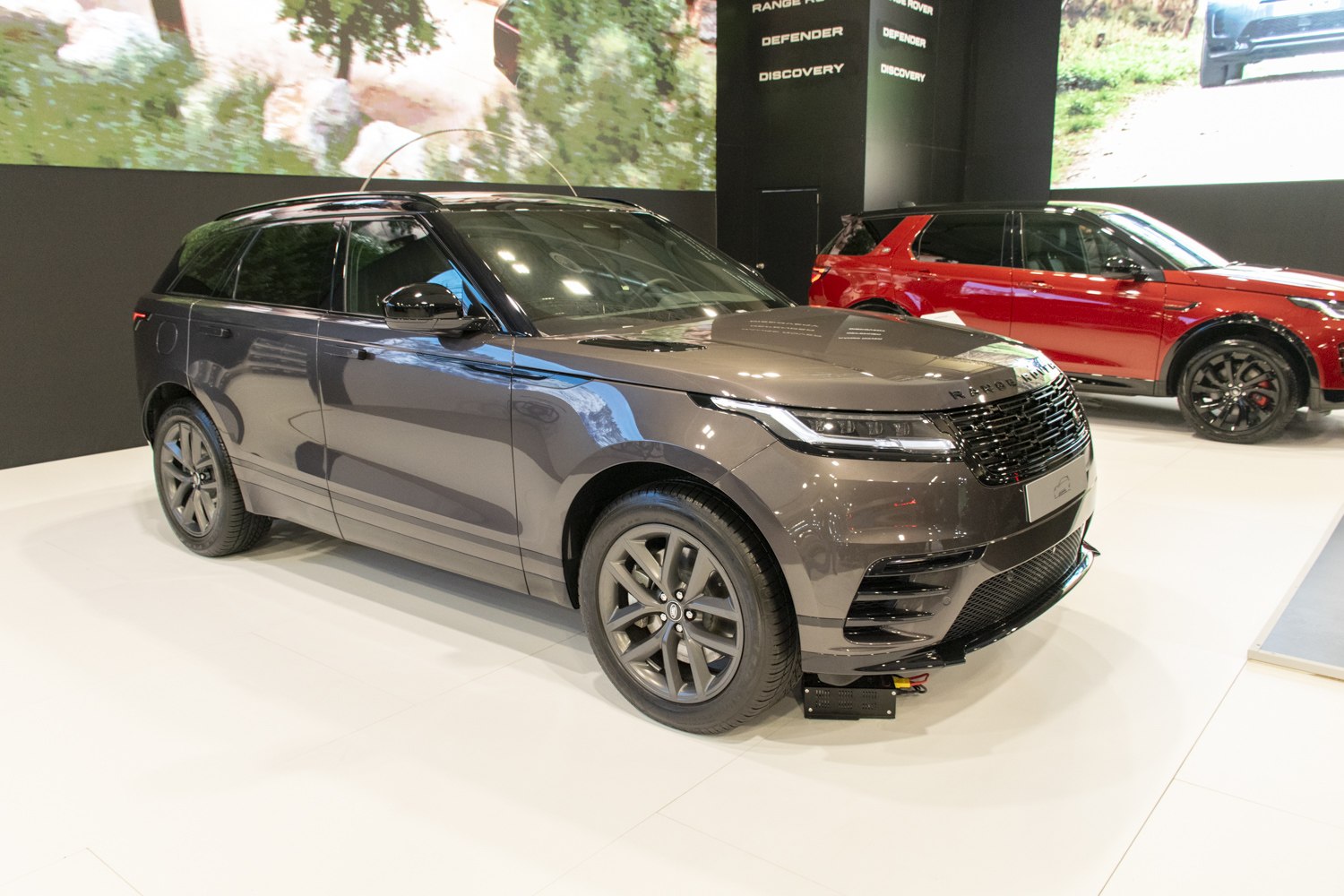 Front and side view of a sleek SUV with LED headlights and modern grille