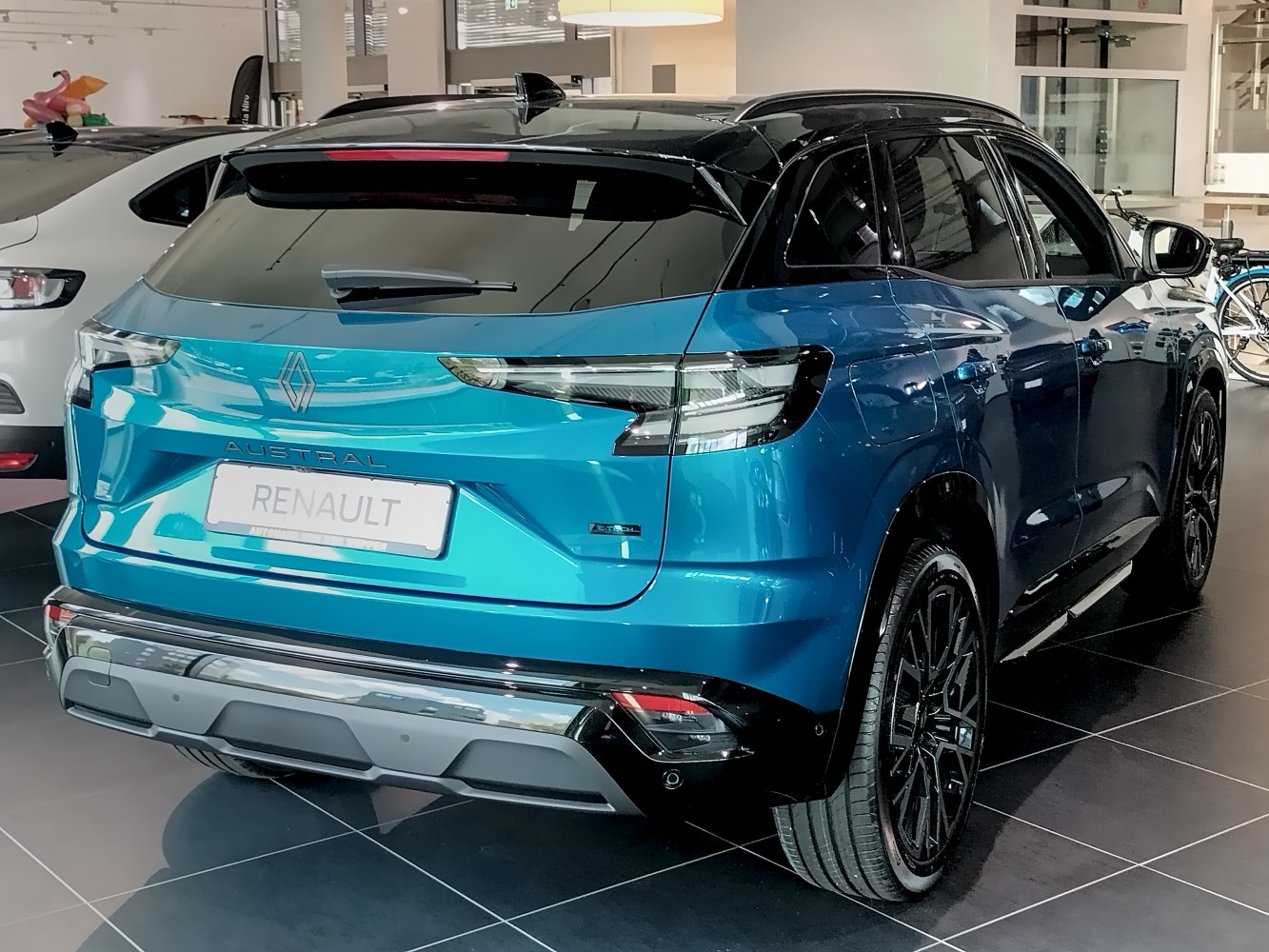 Rear view of a 2025 SUV with sleek taillights and sporty bumper