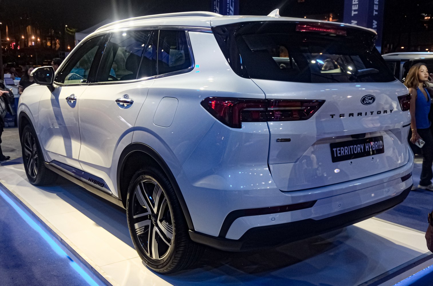 Rear view of hybrid SUV with modern taillights and alloy wheels