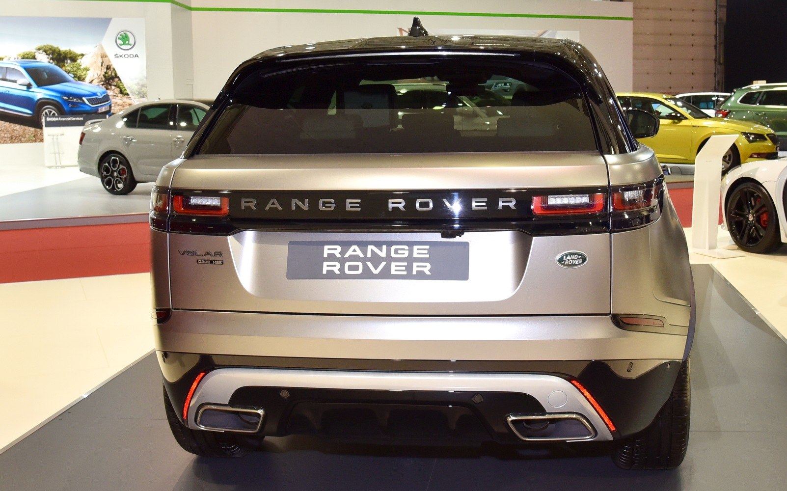 Rear view with distinct tail lights and dual exhausts of a luxury SUV