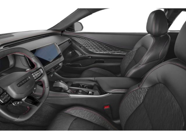 Luxurious front seats and modern dashboard with advanced infotainment