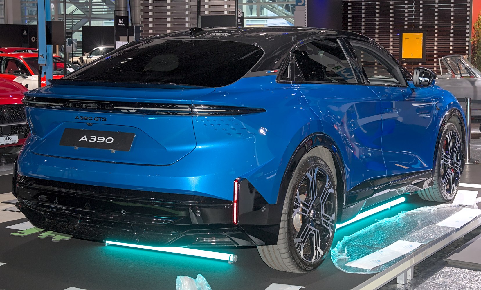 Blue rear view with futuristic wheels and LED lights