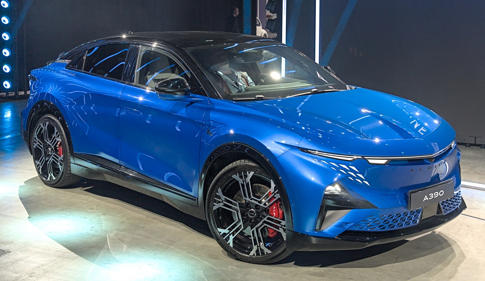 Electric SUV with sharp LED headlights and geometric alloy wheels