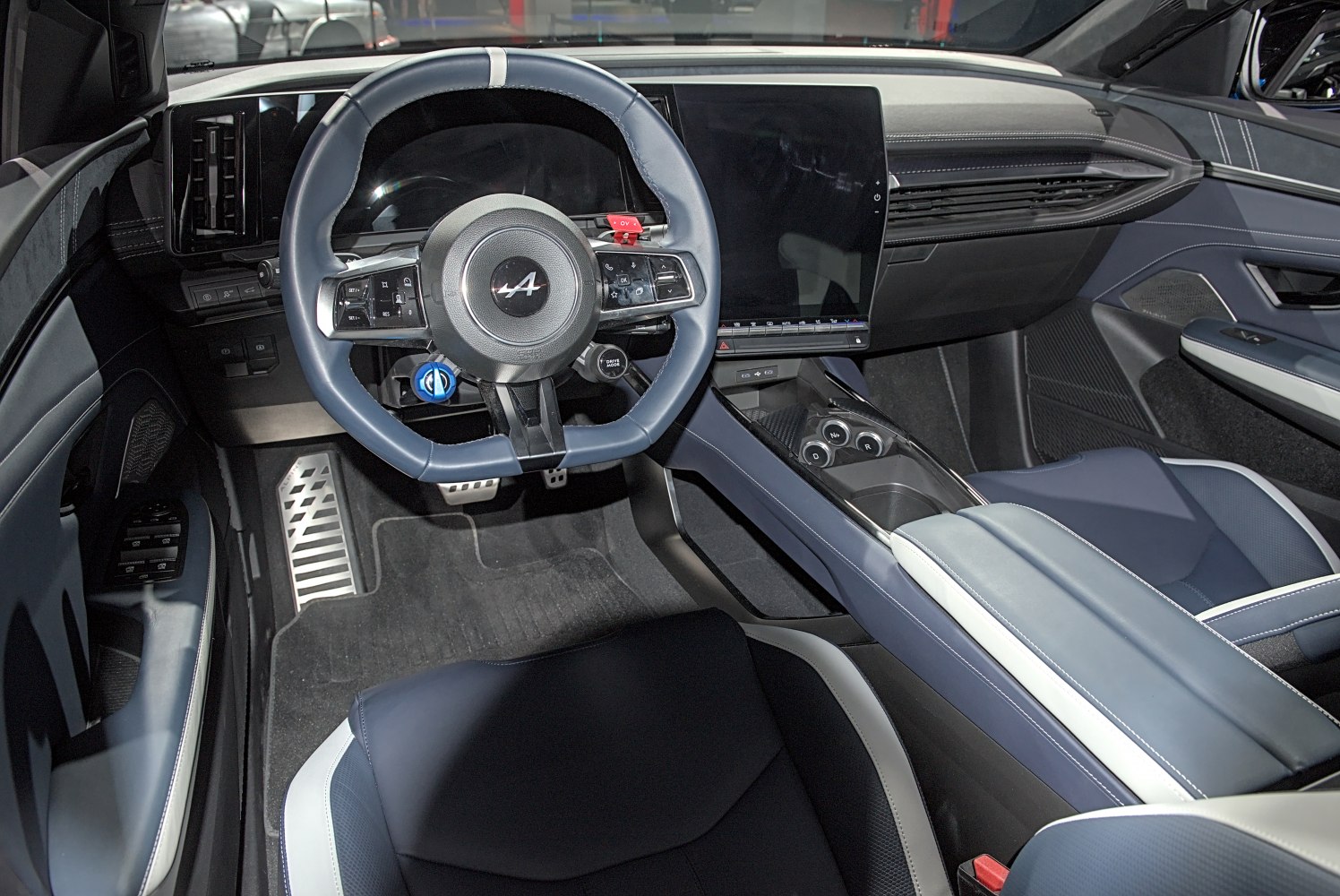 Modern car interior with digital dashboard and multifunction steering wheel