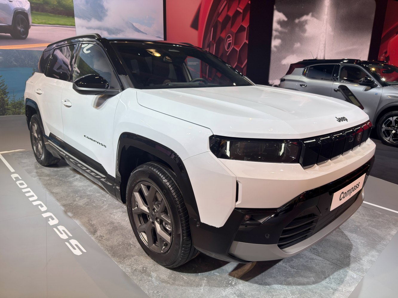 Modern SUV front with LED headlights and striking grille