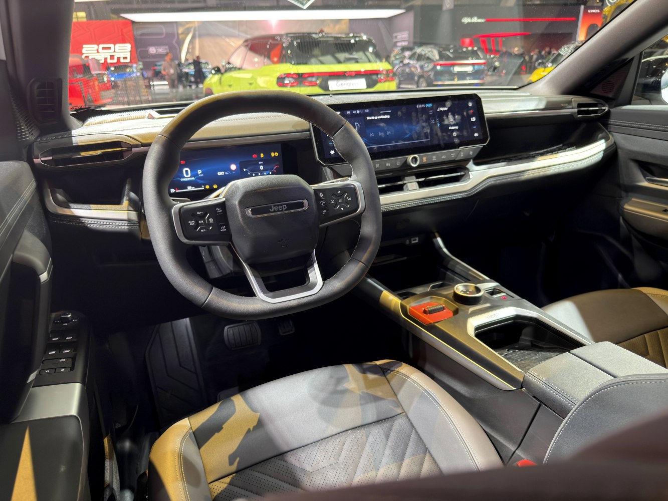 Digital dashboard and modern steering wheel in SUV interior