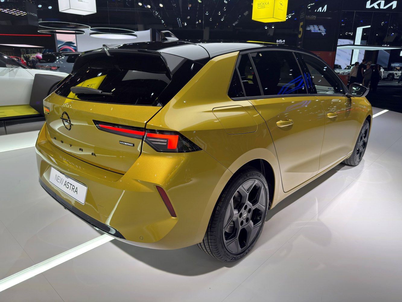 Rear exterior with hybrid badge and modern tail lights