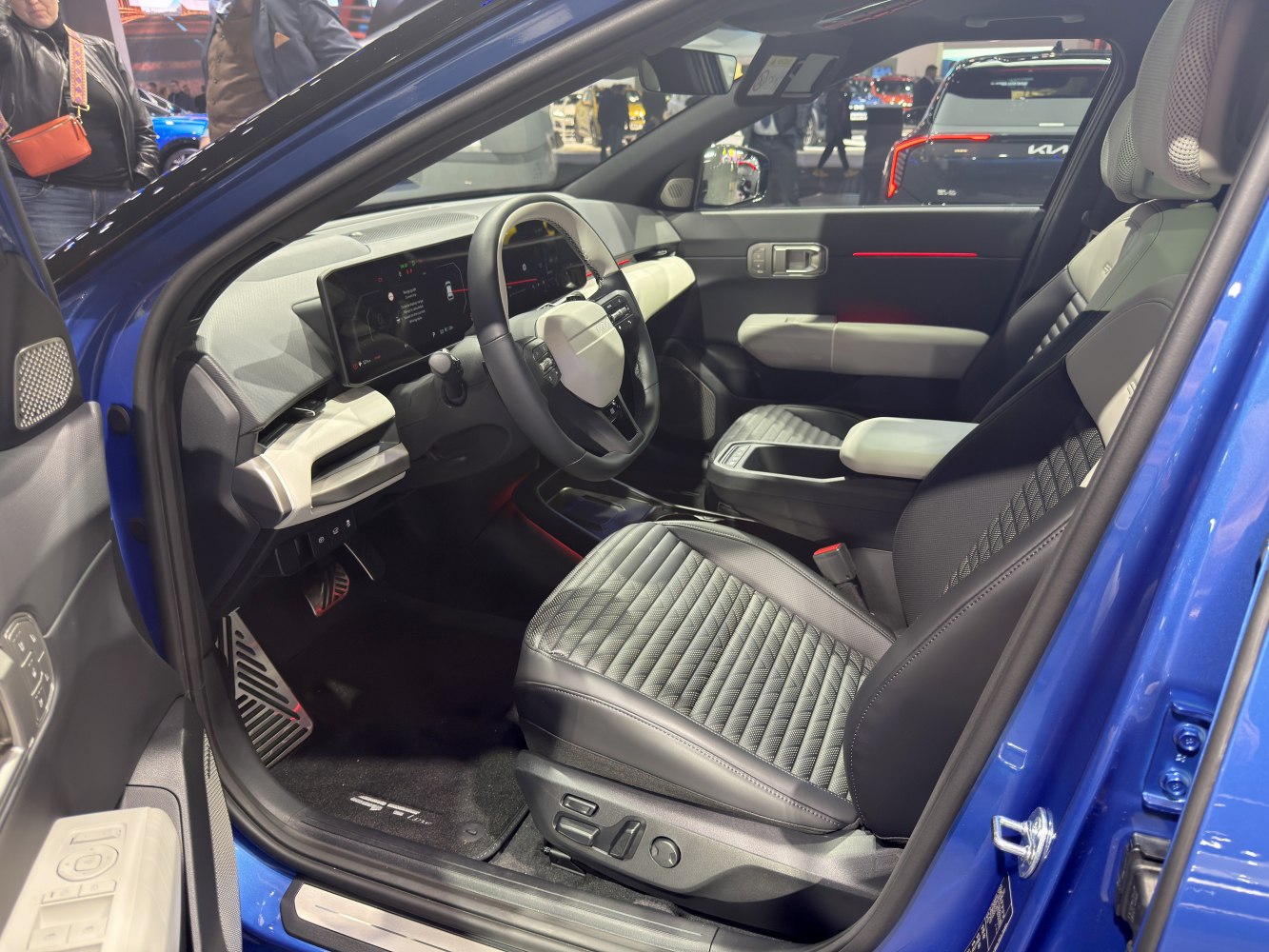 Quilted seats and digital dashboard with ergonomic driver controls