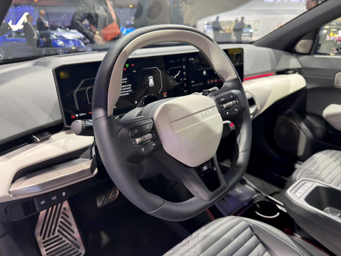 Digital dashboard and multifunction steering wheel in car interior