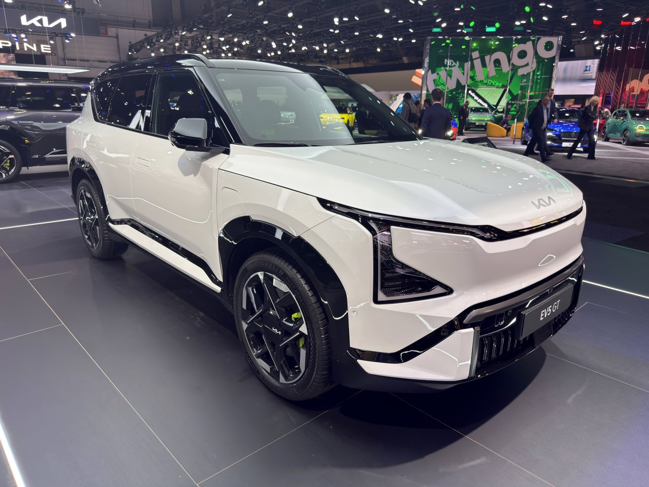 Front and side view of futuristic electric SUV with LED headlights