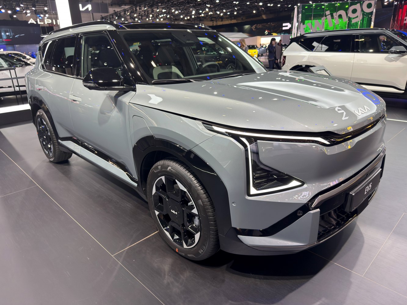 Futuristic electric SUV with sharp LED headlights and angular design