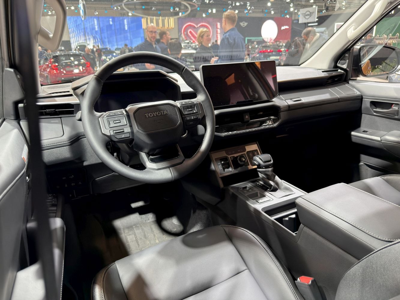 Modern pickup truck interior with digital dashboard and touchscreen display