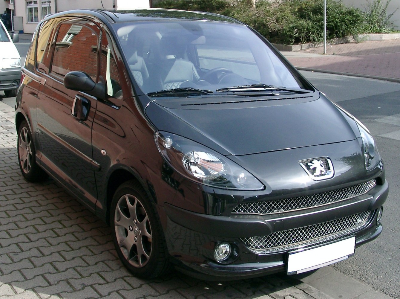 Front exterior with mesh grille and sliding door