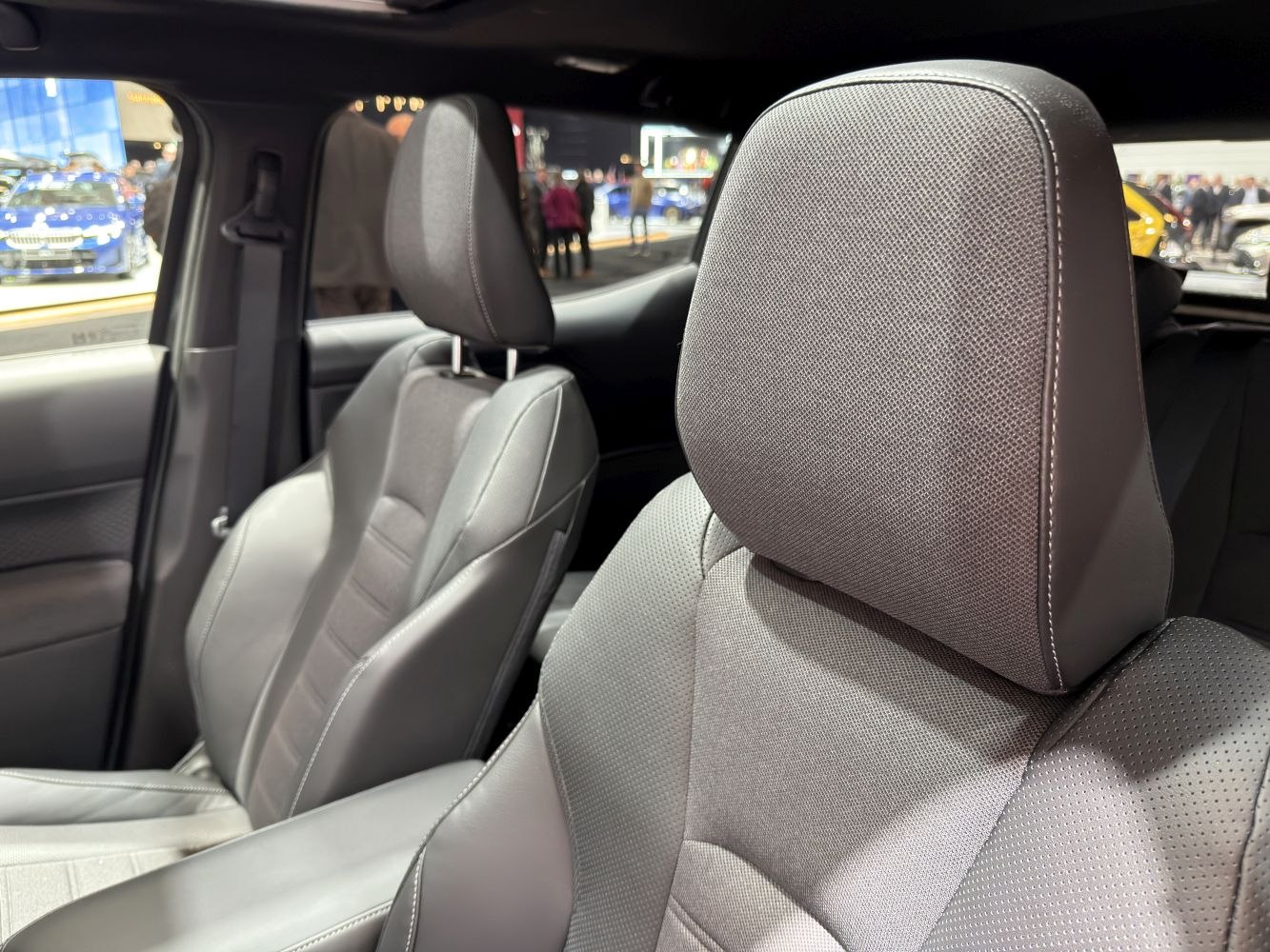 Premium ergonomic front seats with detailed stitching