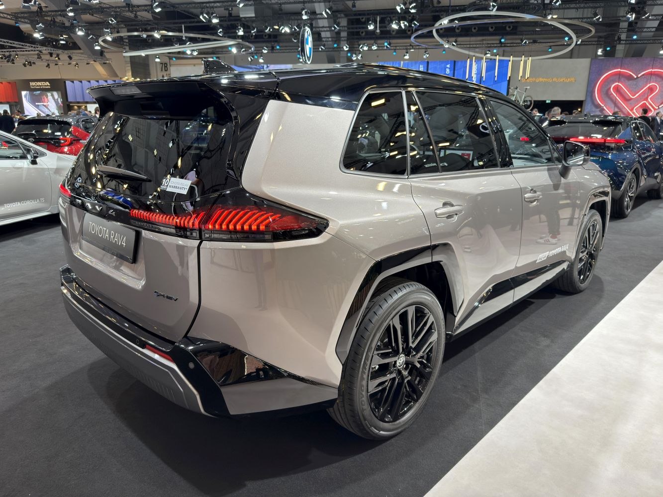 Sleek rear view with LED taillights and black alloy wheels.