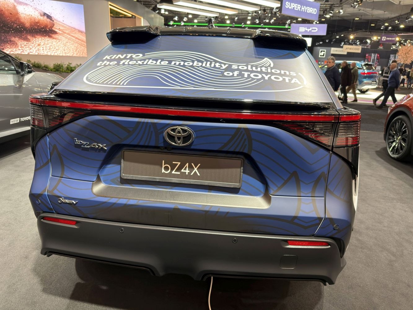 Rear view of facelifted vehicle with sleek taillights and branding