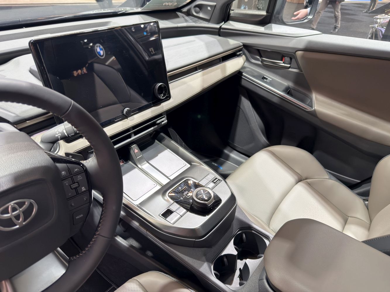 Digital display and rotary control knob in car interior