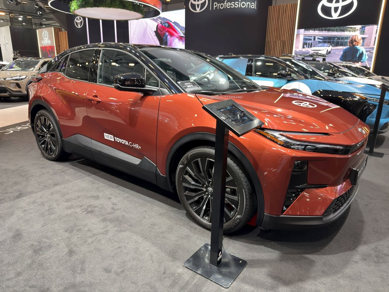 Burnt orange compact SUV with black roof and sporty alloy wheels