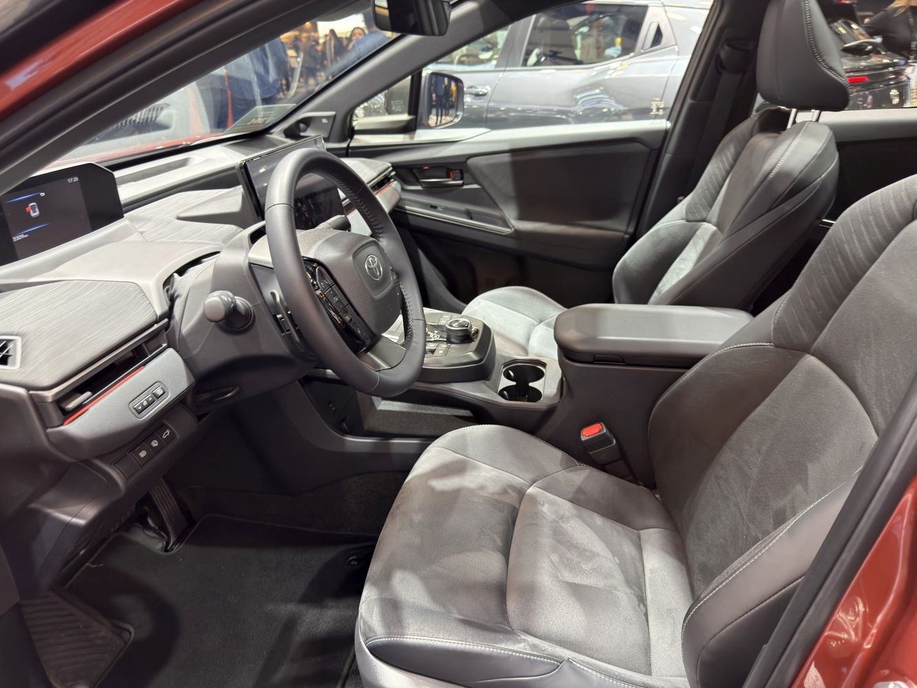 Modern car interior with digital dashboard and ergonomic front seats