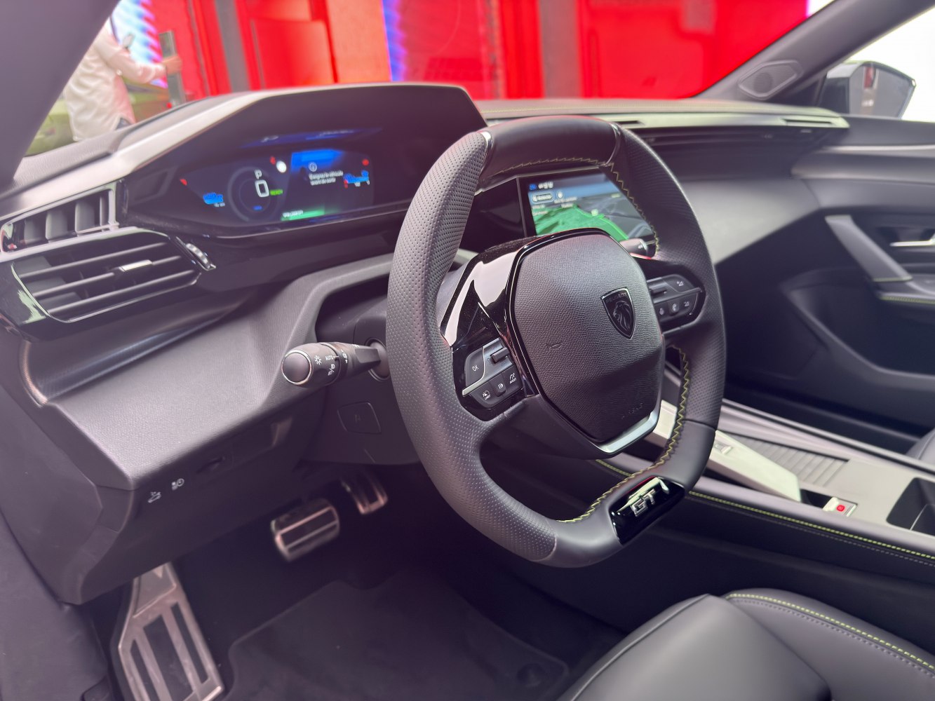 Digital dashboard and sporty GT steering wheel with detailed stitching