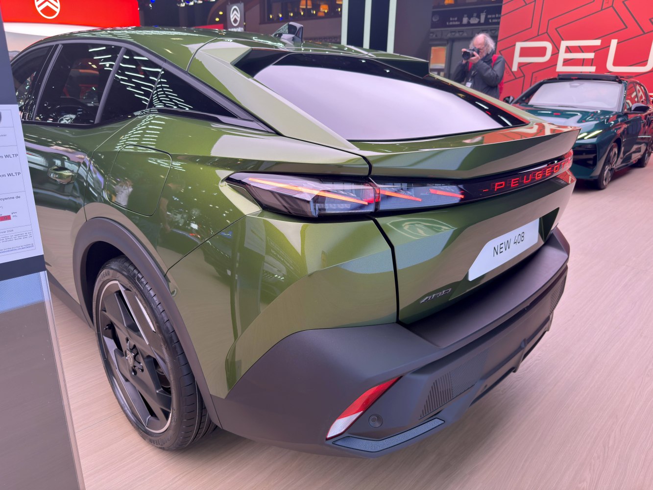 Rear view of crossover with sleek LED taillights and modern design.