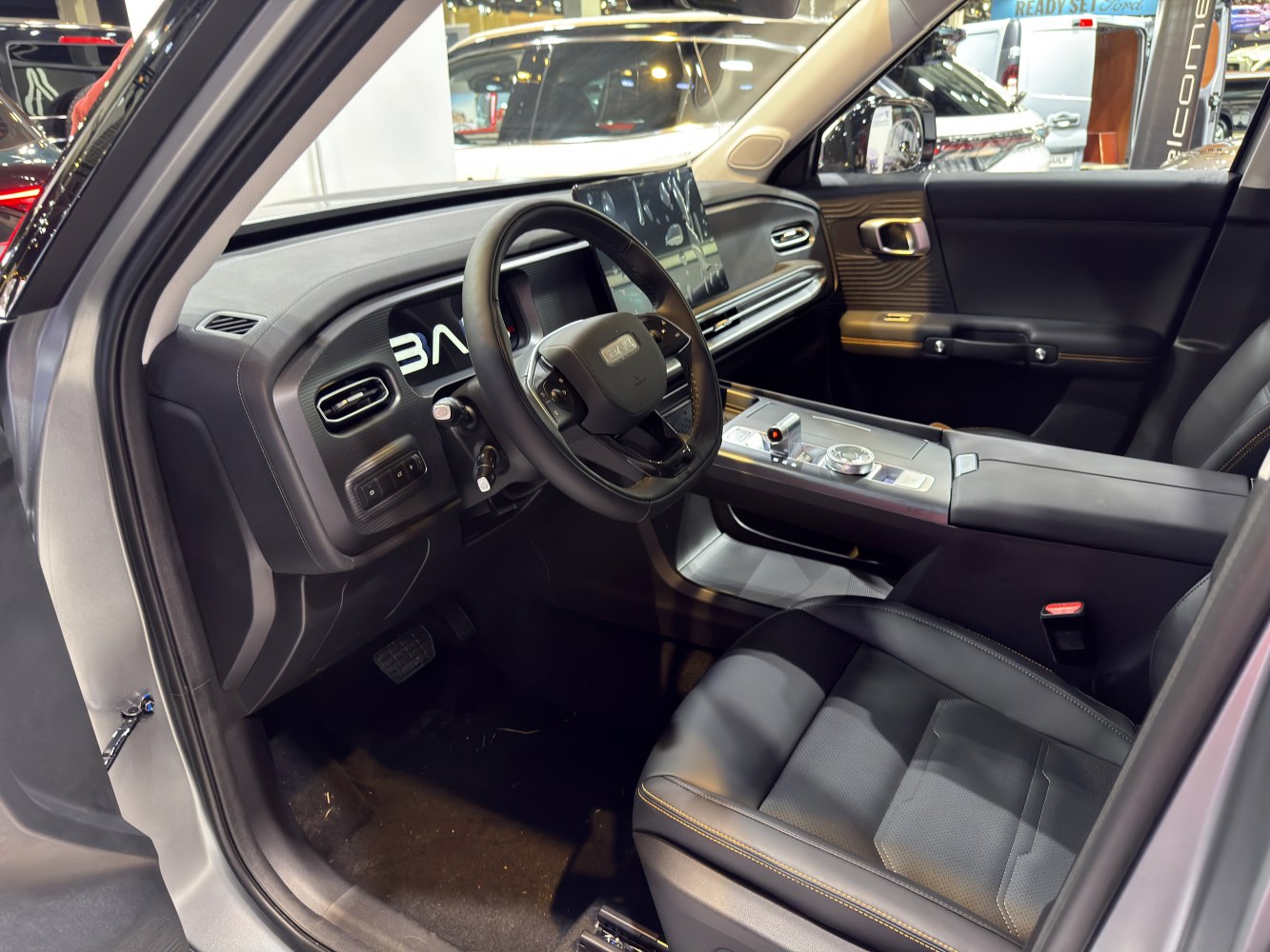 Modern car interior with digital dashboard and multifunction steering wheel