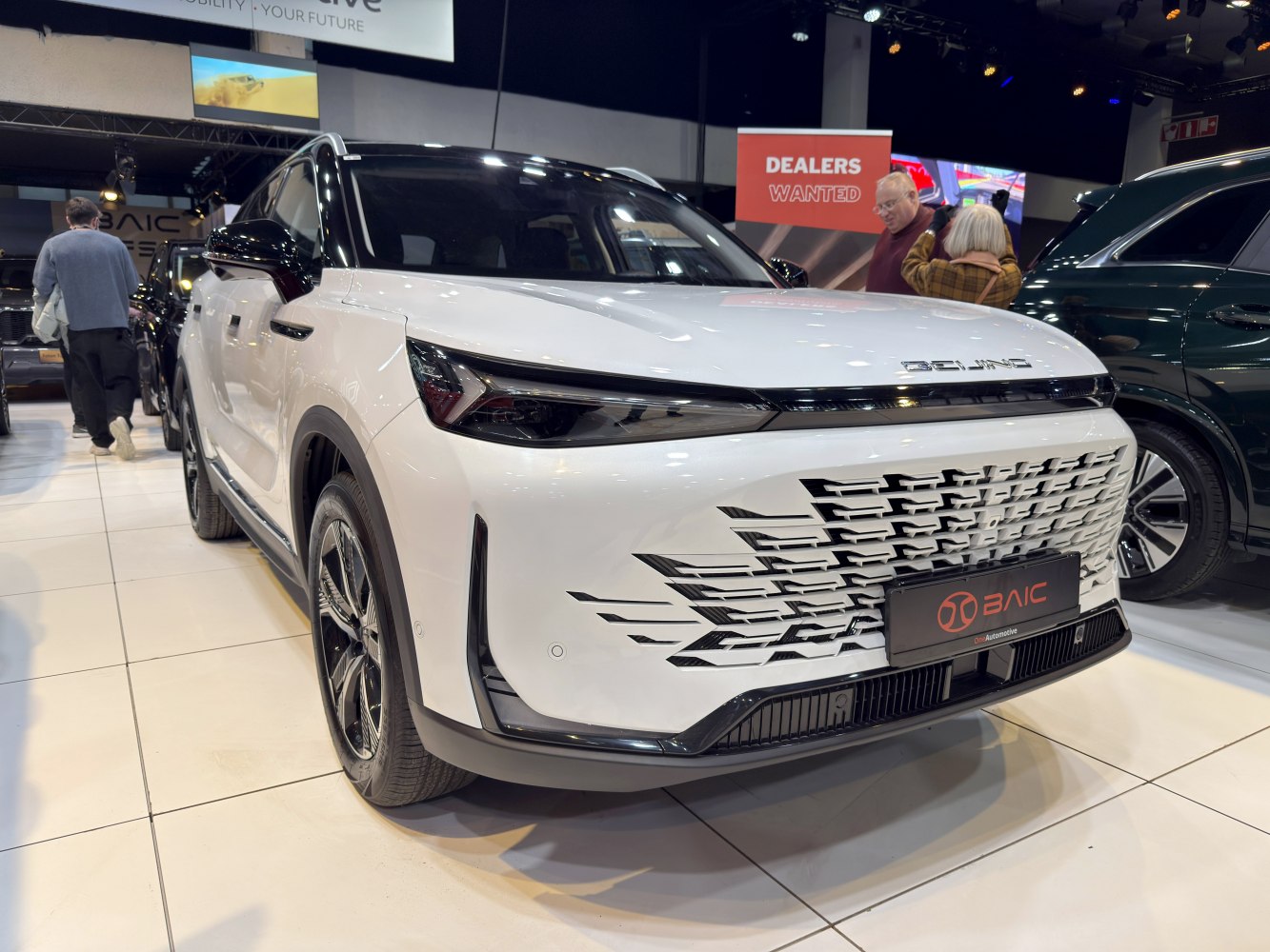 Modern SUV front grille and sleek headlights