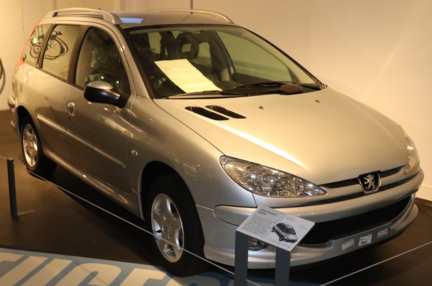 Silver station wagon with front and side profile visible