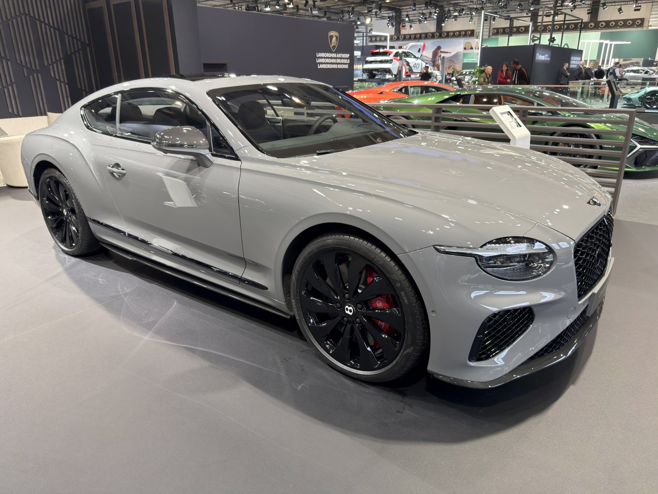 Sleek luxury coupe with black alloy wheels and sporty front grille
