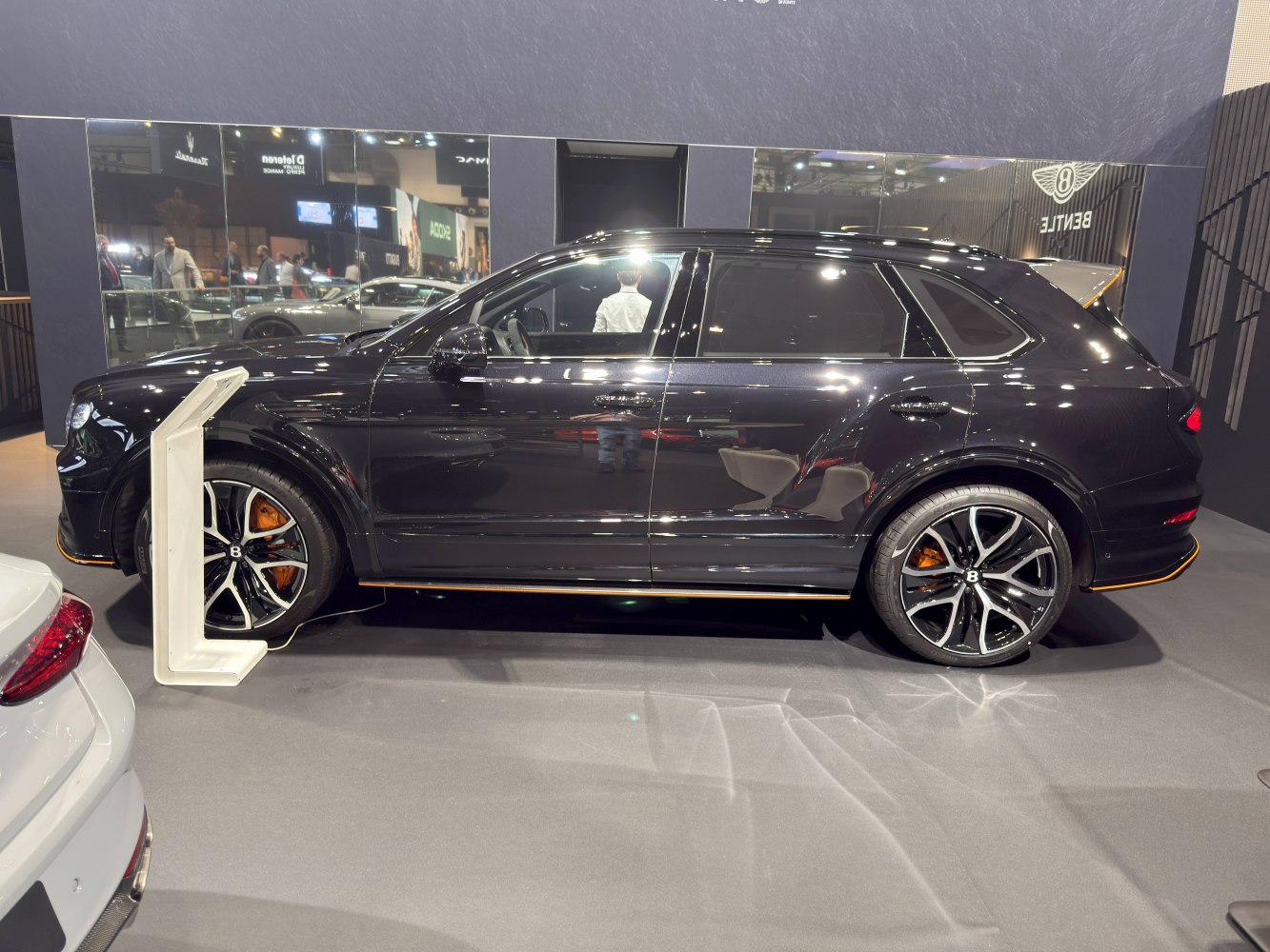Side profile of luxury SUV with alloy wheels and sleek design