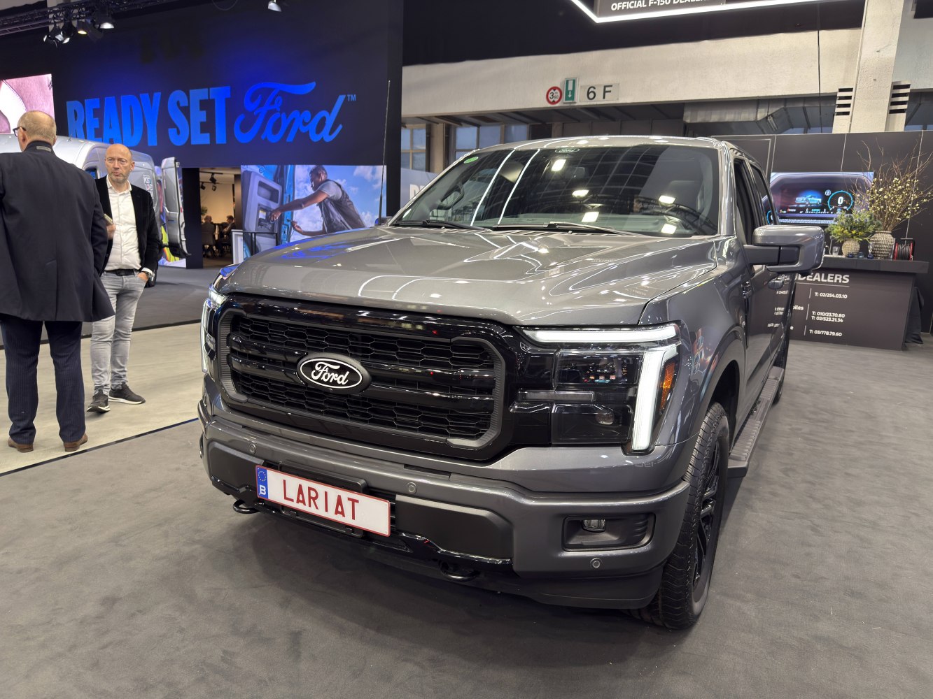 Pickup truck front with black grille and LED headlights