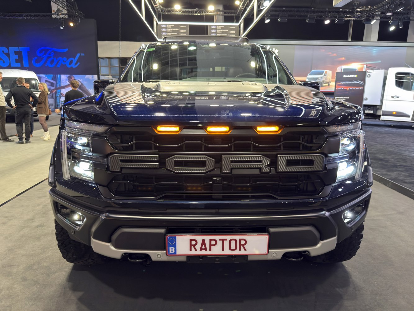 Close-up of Ford F-150 XV SuperCrew front grill and LED lights