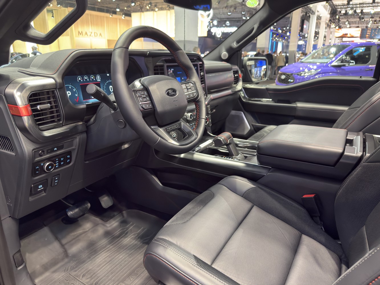 Modern pickup interior with digital dashboard and multifunction steering