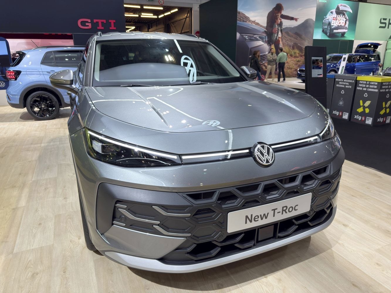 Front view with sleek LED headlights and hexagonal grille