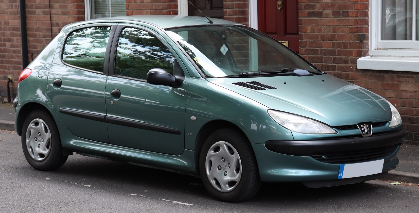 Compact 5-door hatchback with rounded headlights and aerodynamic curves