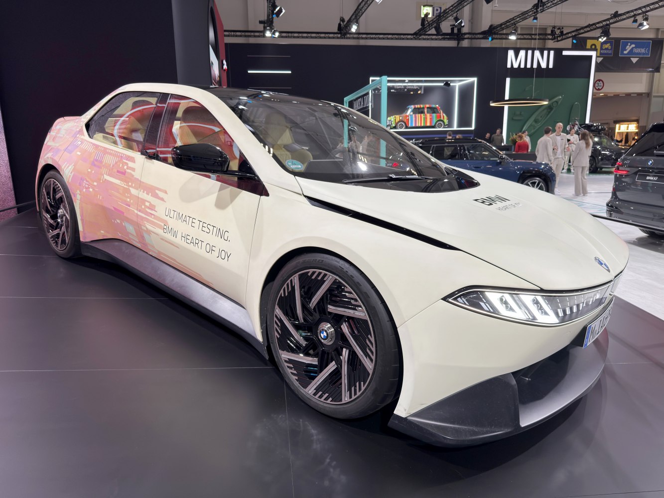 Futuristic electric sedan with sleek aerodynamic shape and LED headlights