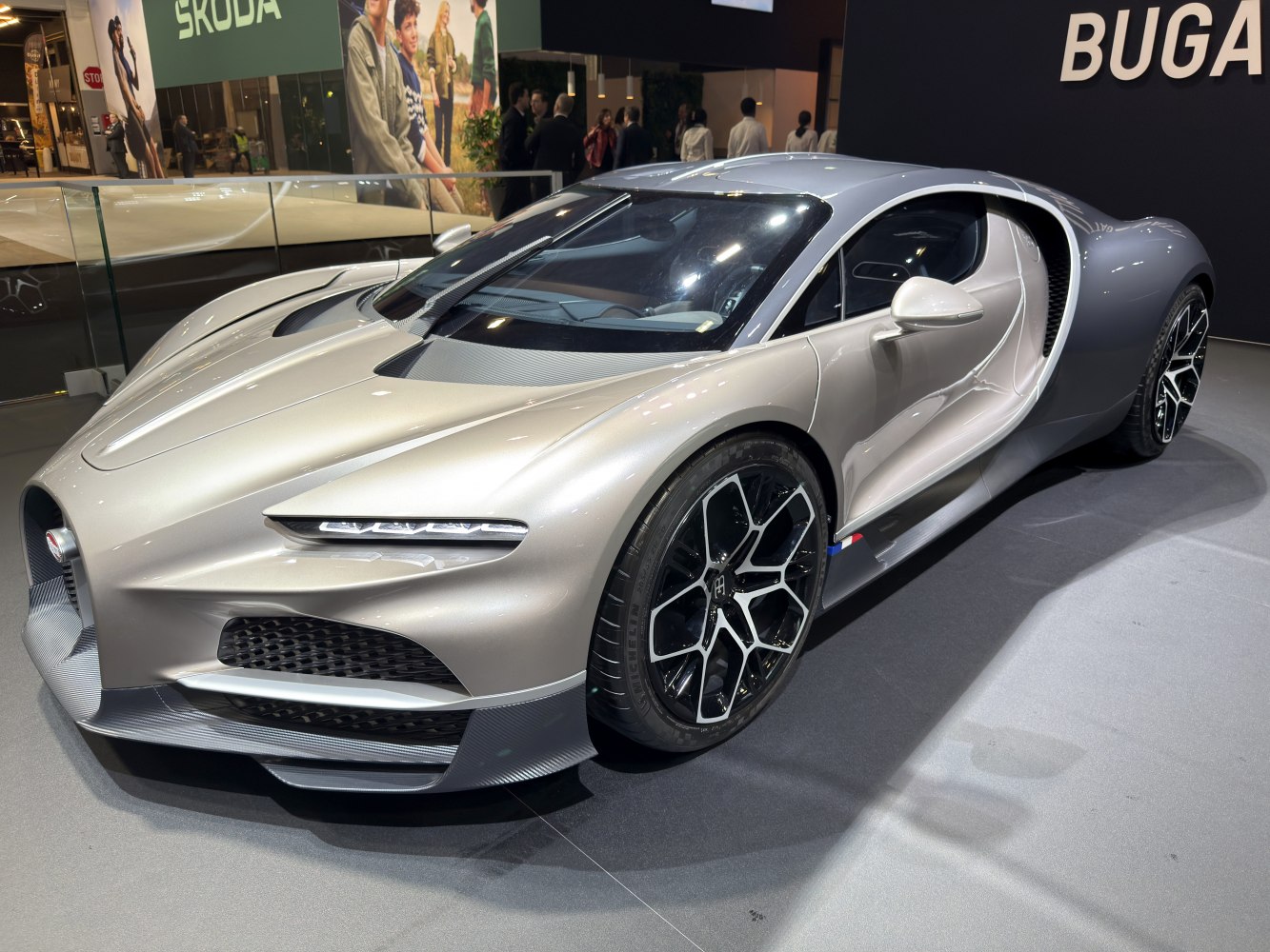 Aerodynamic front end with sharp LED headlights and futuristic multi-spoke wheels
