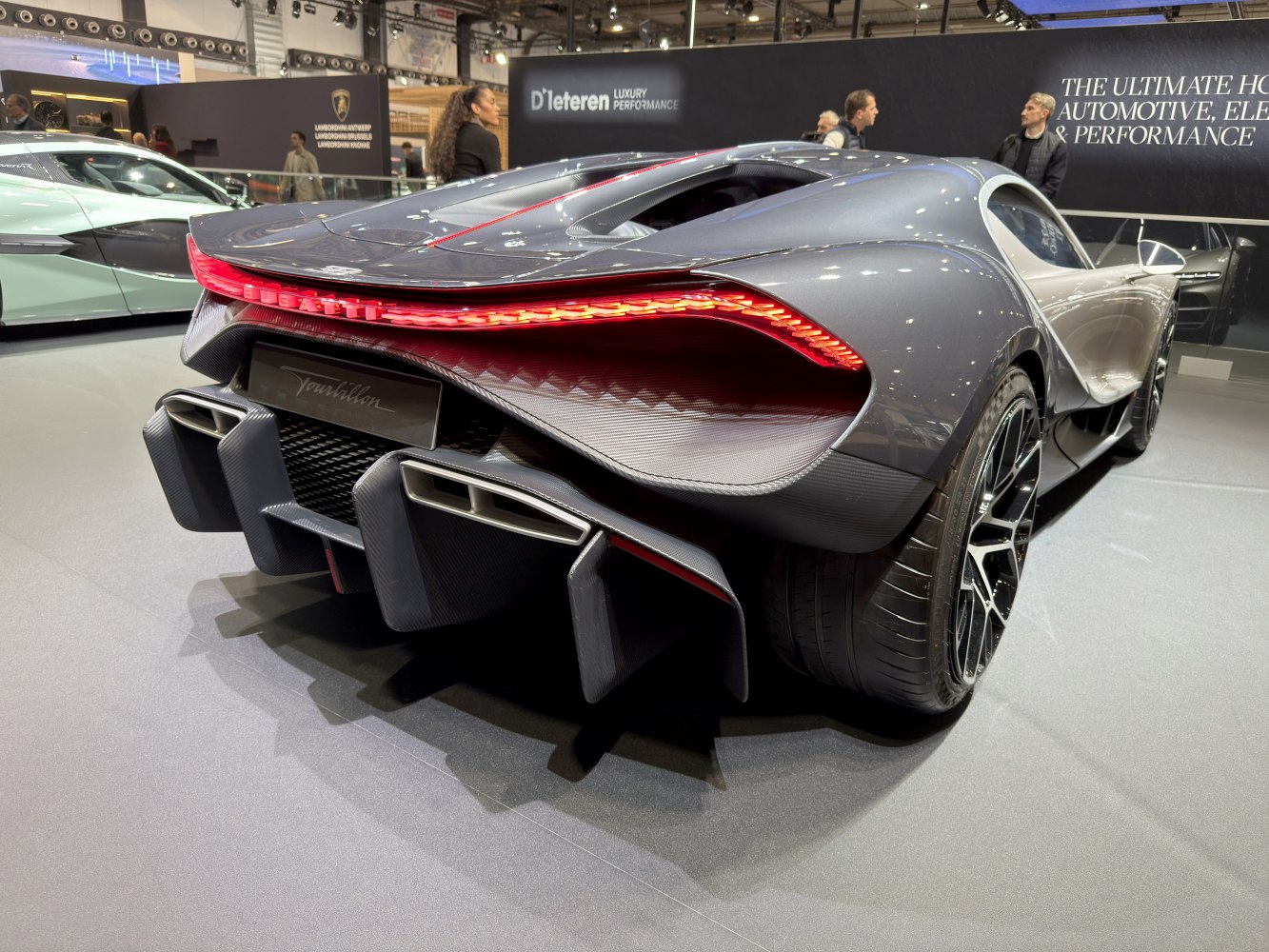 Rear LED light strip and large aerodynamic diffuser with carbon fiber details.