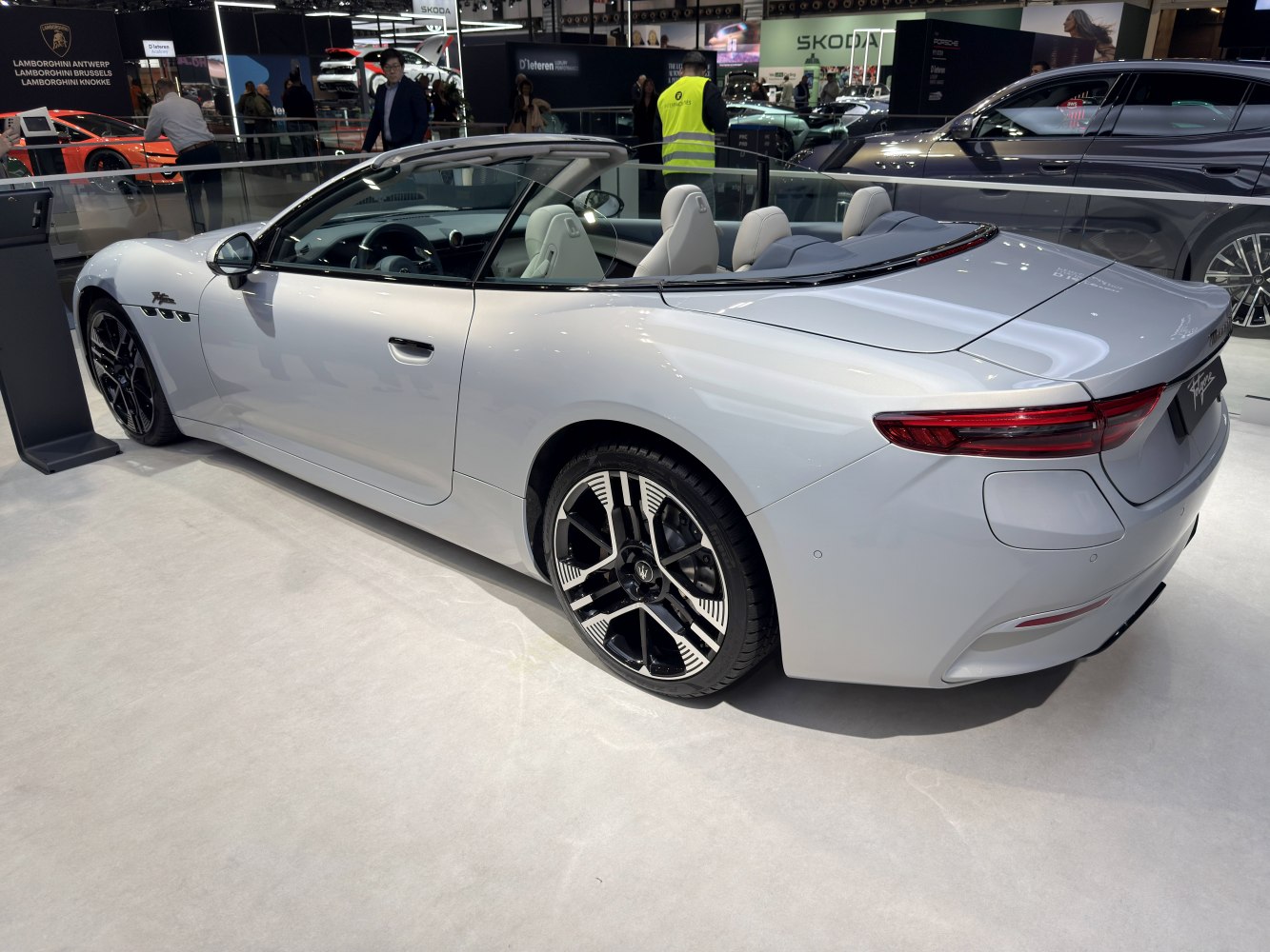 Sleek convertible with modern alloy wheels and smooth rear design