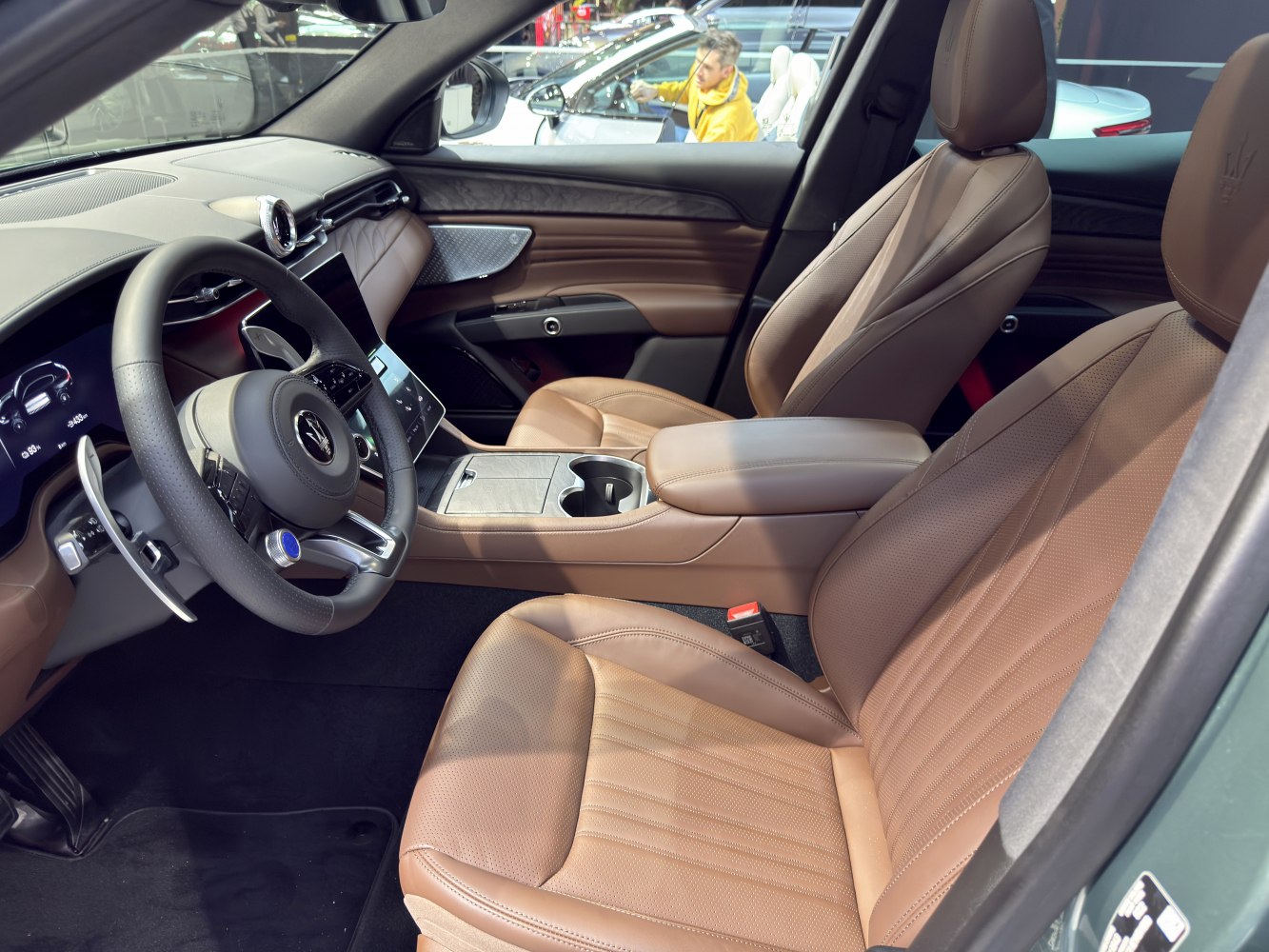 Brown leather seats and modern luxury car interior cockpit