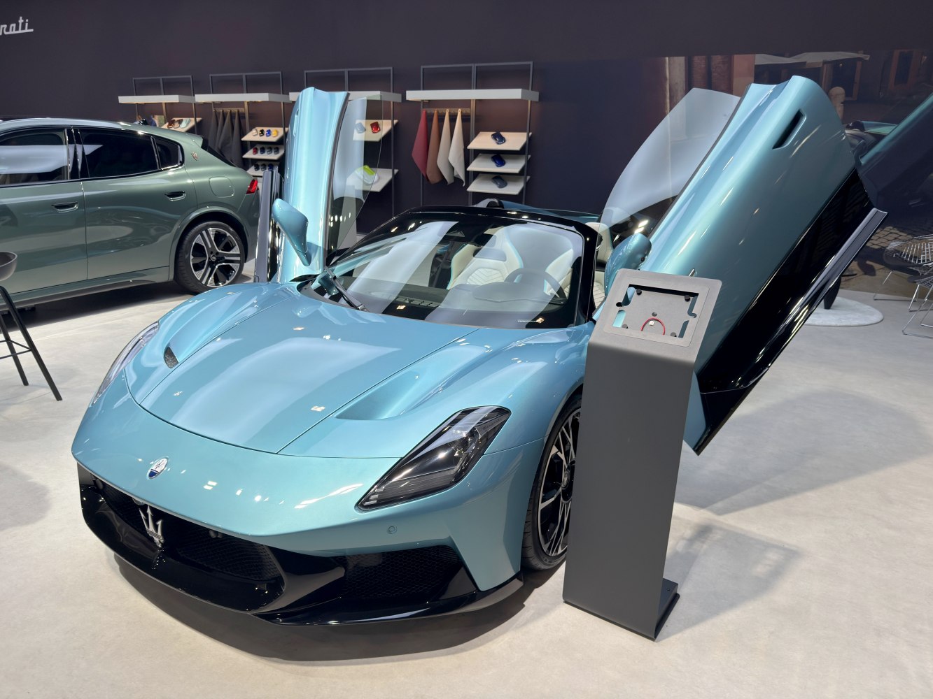 Sports car with butterfly doors and aerodynamic design