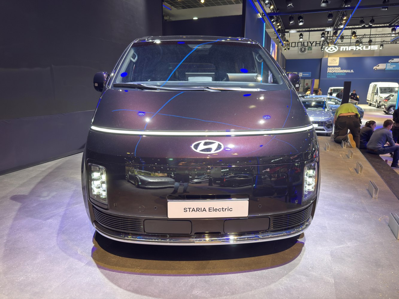 Futuristic front view with dual-level LED headlights and sleek modern design