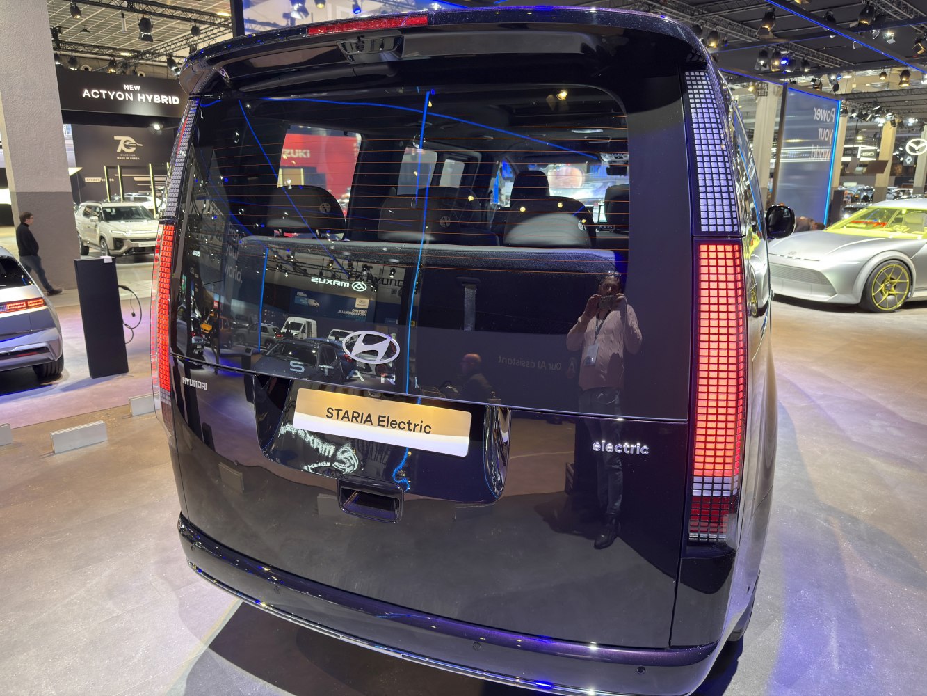 Rear view with tall LED taillights and large rear window