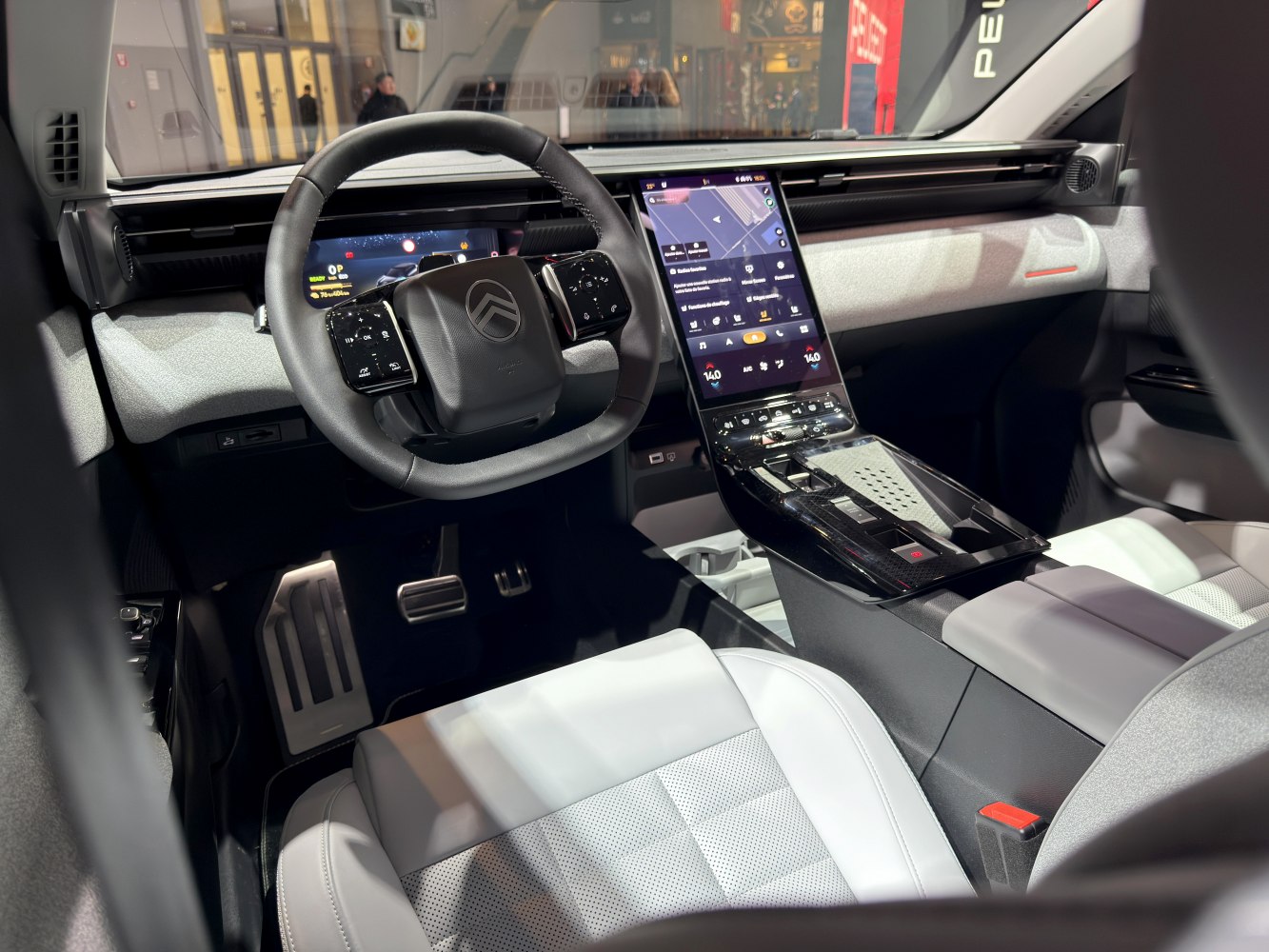 Futuristic dashboard with digital cluster and vertical touchscreen center console