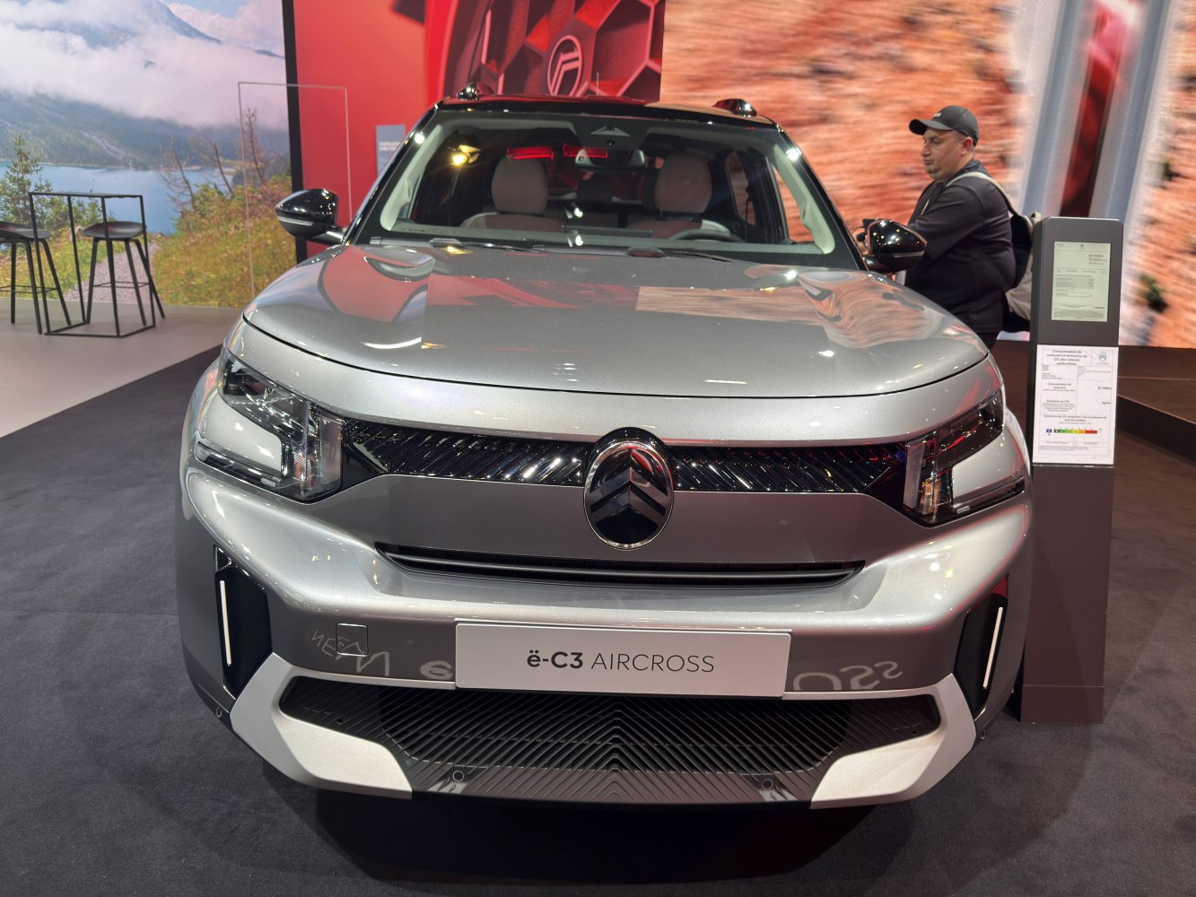 Front view with grille, headlights, and bumper of electric SUV