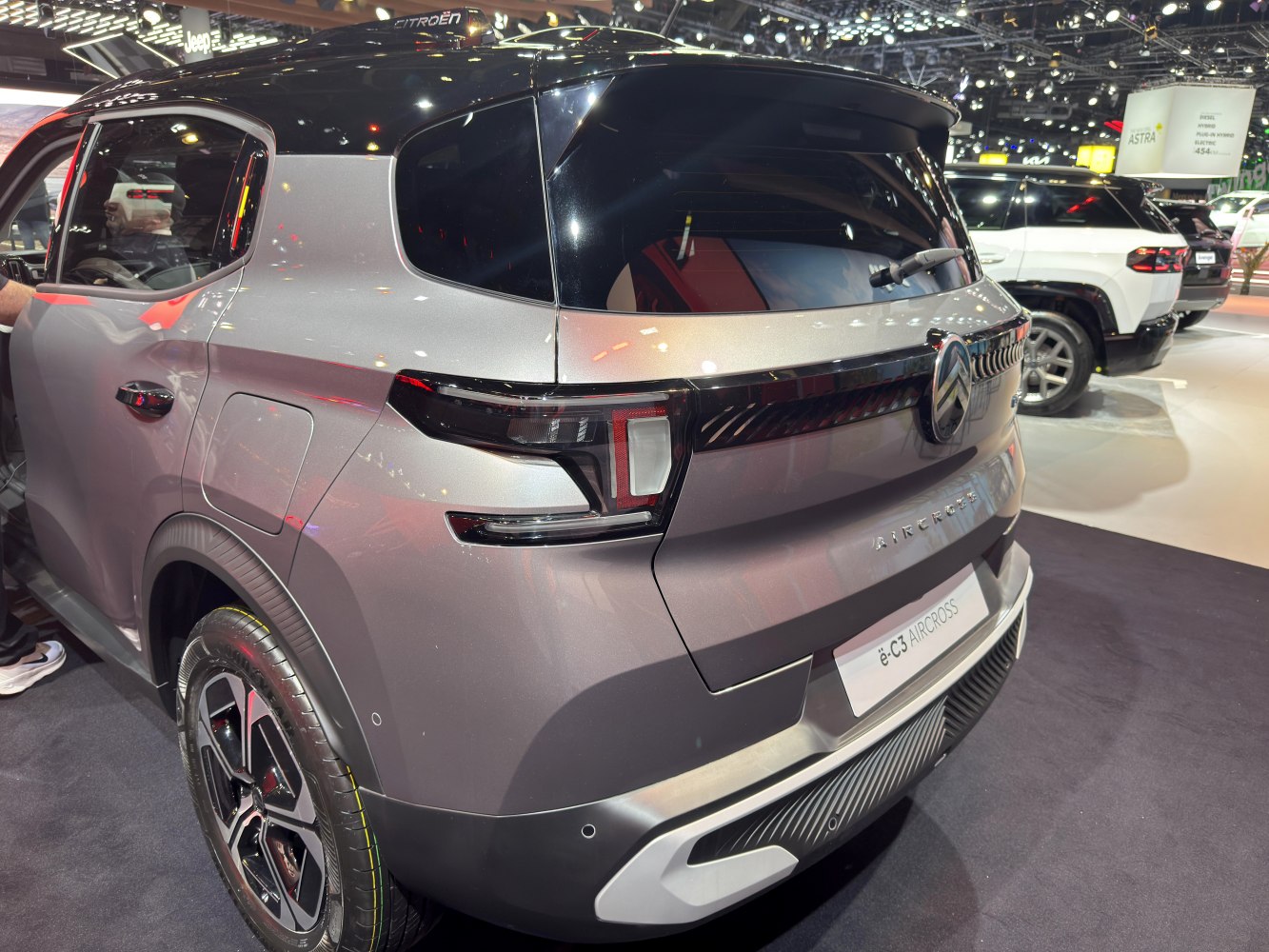 Rear view showing LED taillights and sleek rear window design.