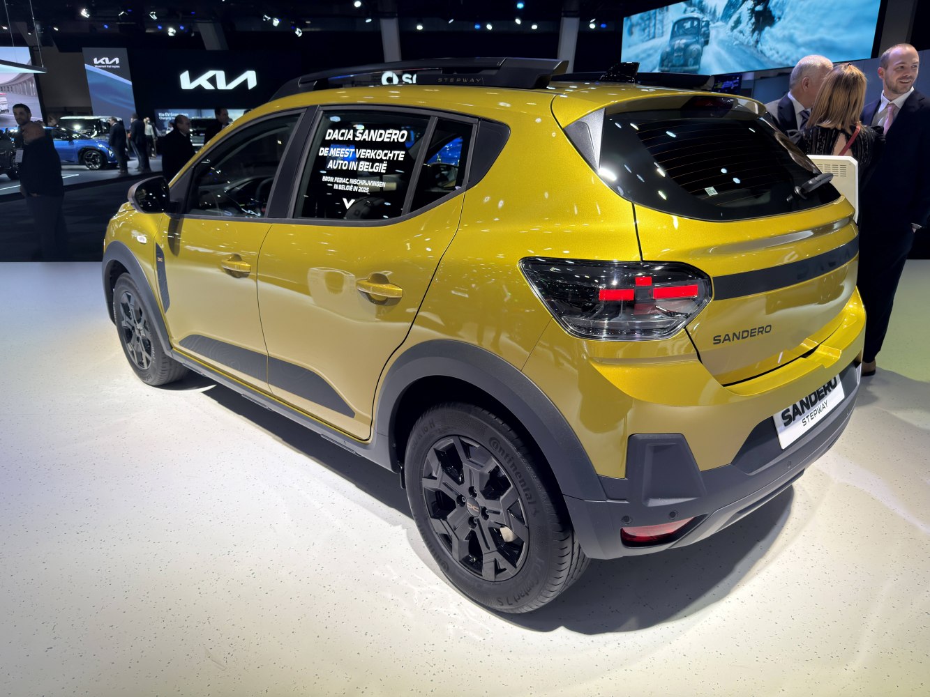 Rear side view with black alloy wheels and modern taillights